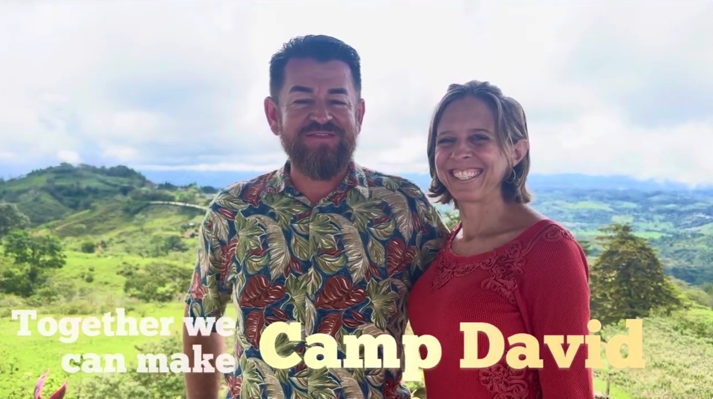 Pastor Christian and Megan together, with the hills of southern Costa Rica behind them